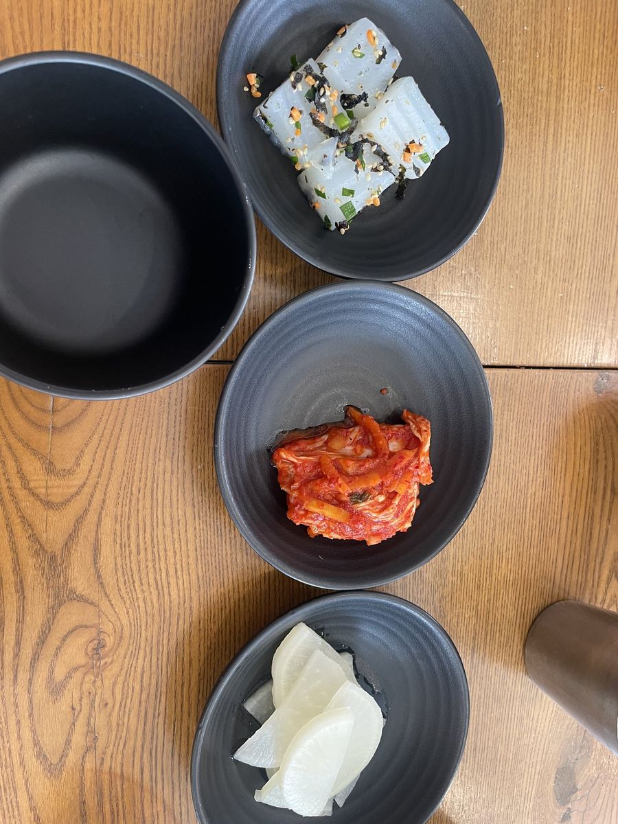 The side dishes: seasoned jelly, kimchi, pickled radish